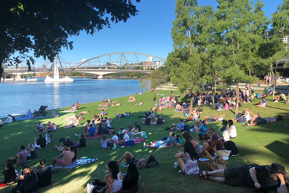 South Bank, Brisbane - 🌴 South Bank Parklands contrasting to Brisbane City  just over the river. Our lush parklands hosts 3 free to use pool spaces,  offering stunning river views of Brisbane